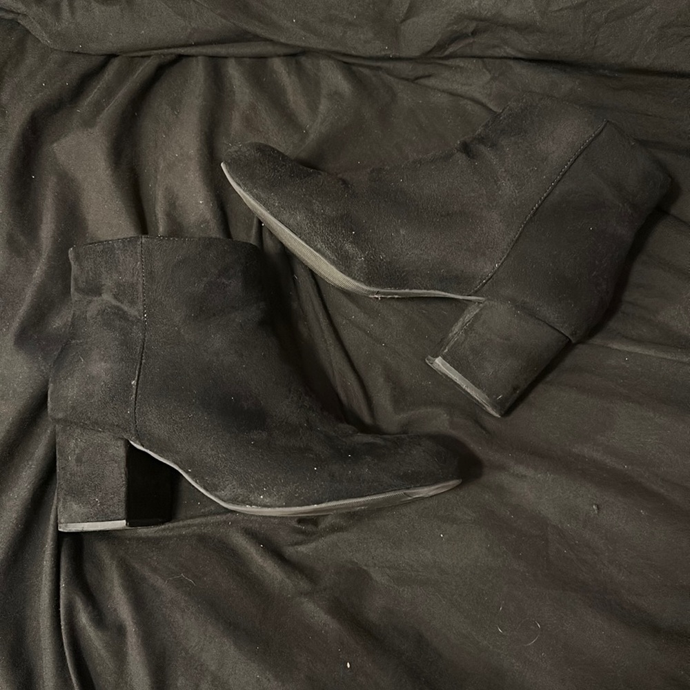 Worn wide black booties